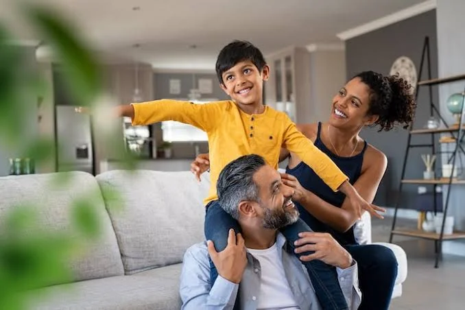Family at home together, representing immigration cases such as extreme hardship waivers and cancellation of removal